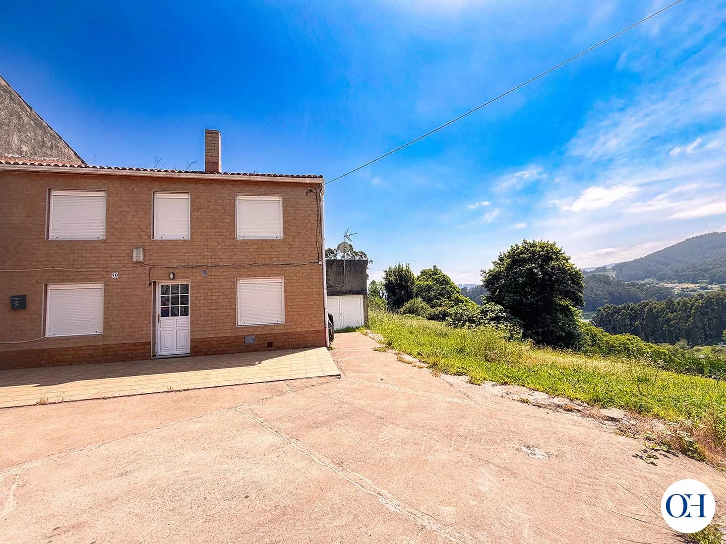 Casa en venta en Figueiroa, Cariño, con finca, garaje y vistas al mar